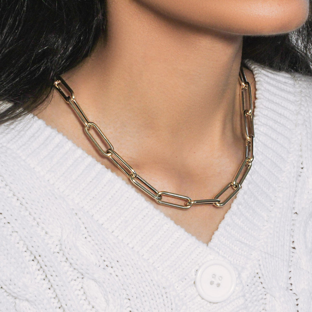 14k yellow gold rounded paperclip chain necklace with modern design and elegant stud accents.