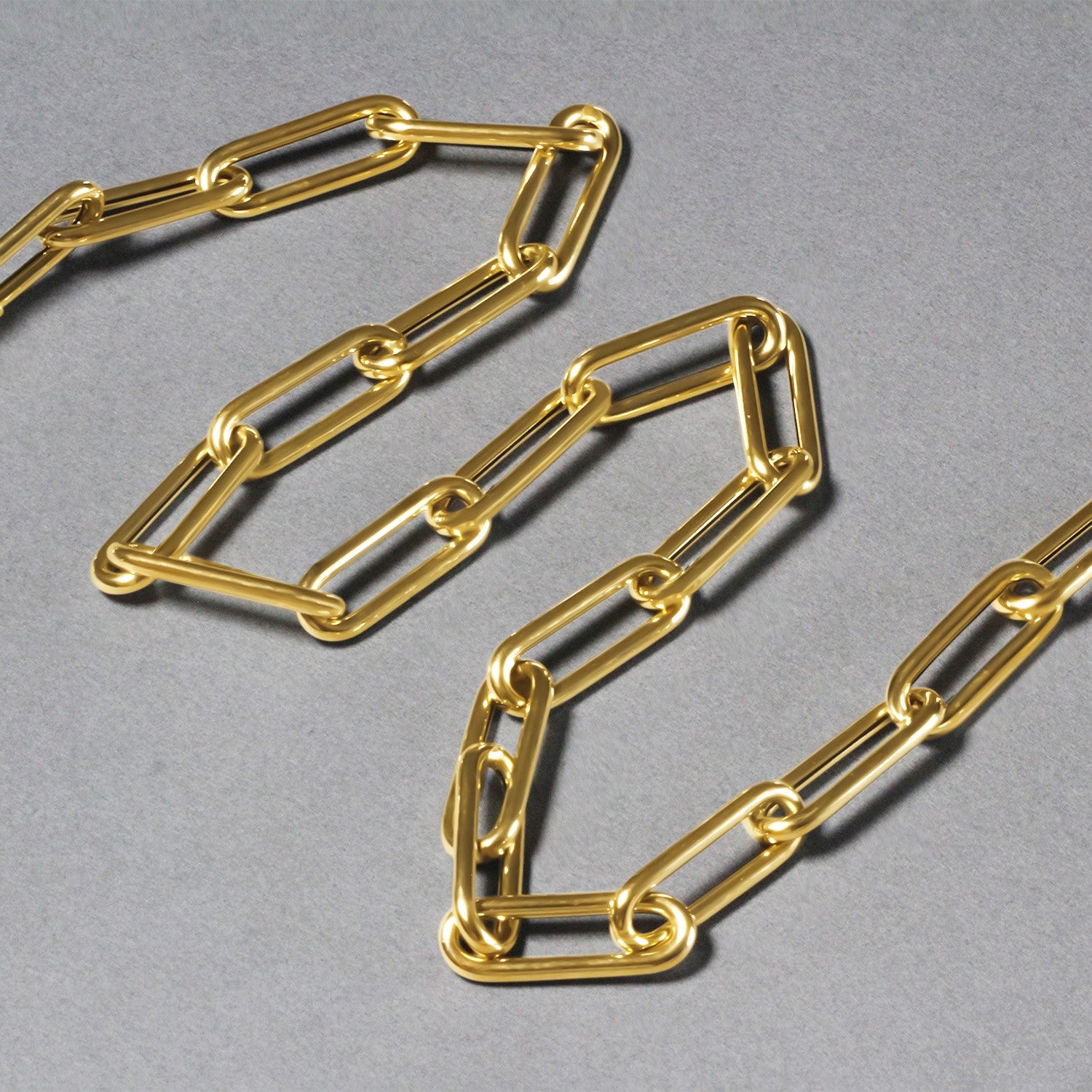 14k yellow gold rounded paperclip chain necklace with modern design and elegant, versatile appeal.