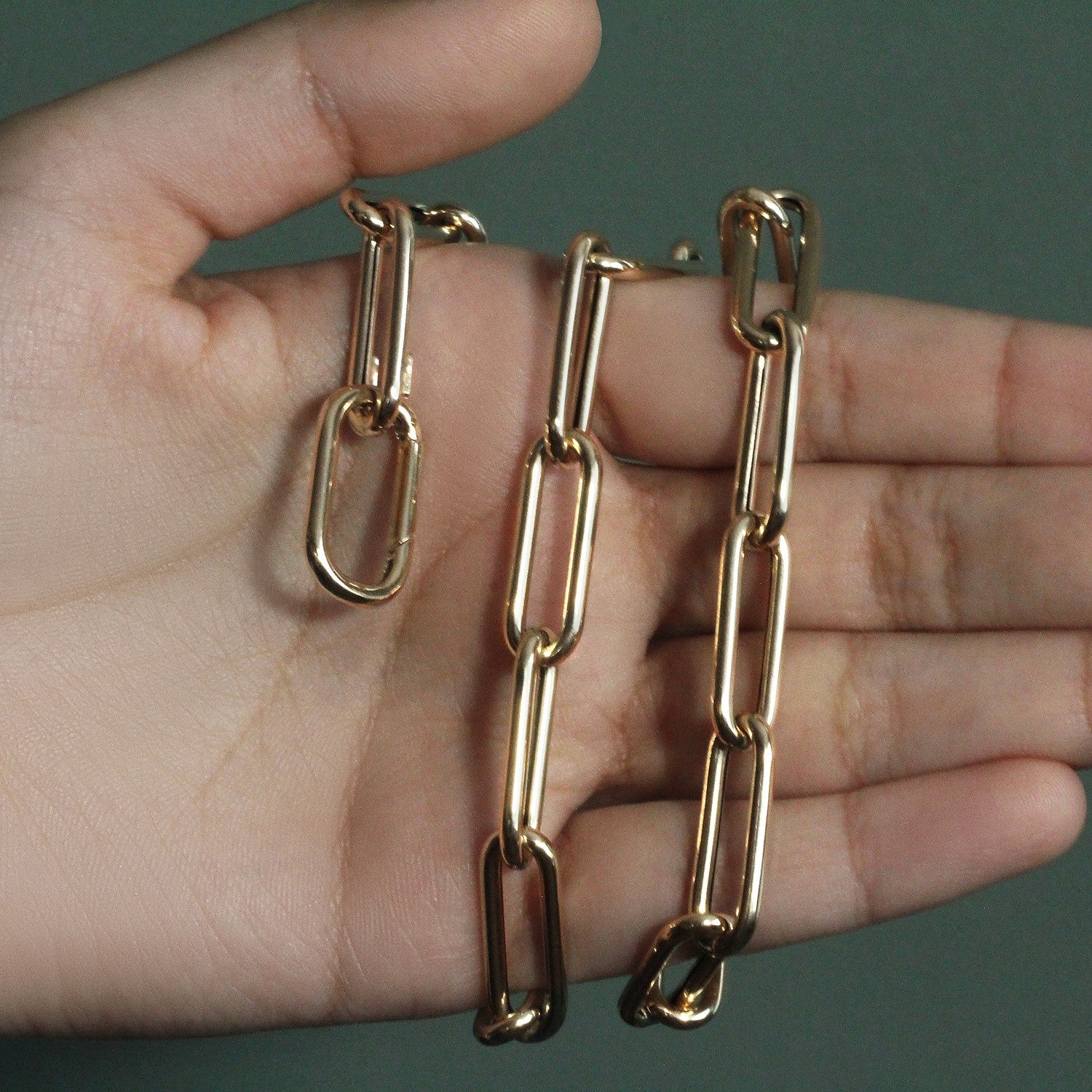 14k yellow gold rounded paperclip chain necklace with modern design, perfect for layering or elegant solo wear.
