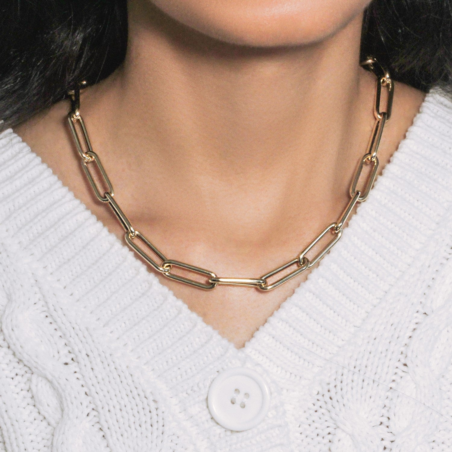 14k yellow gold rounded paperclip chain necklace with modern design, perfect for layering or as a statement piece.