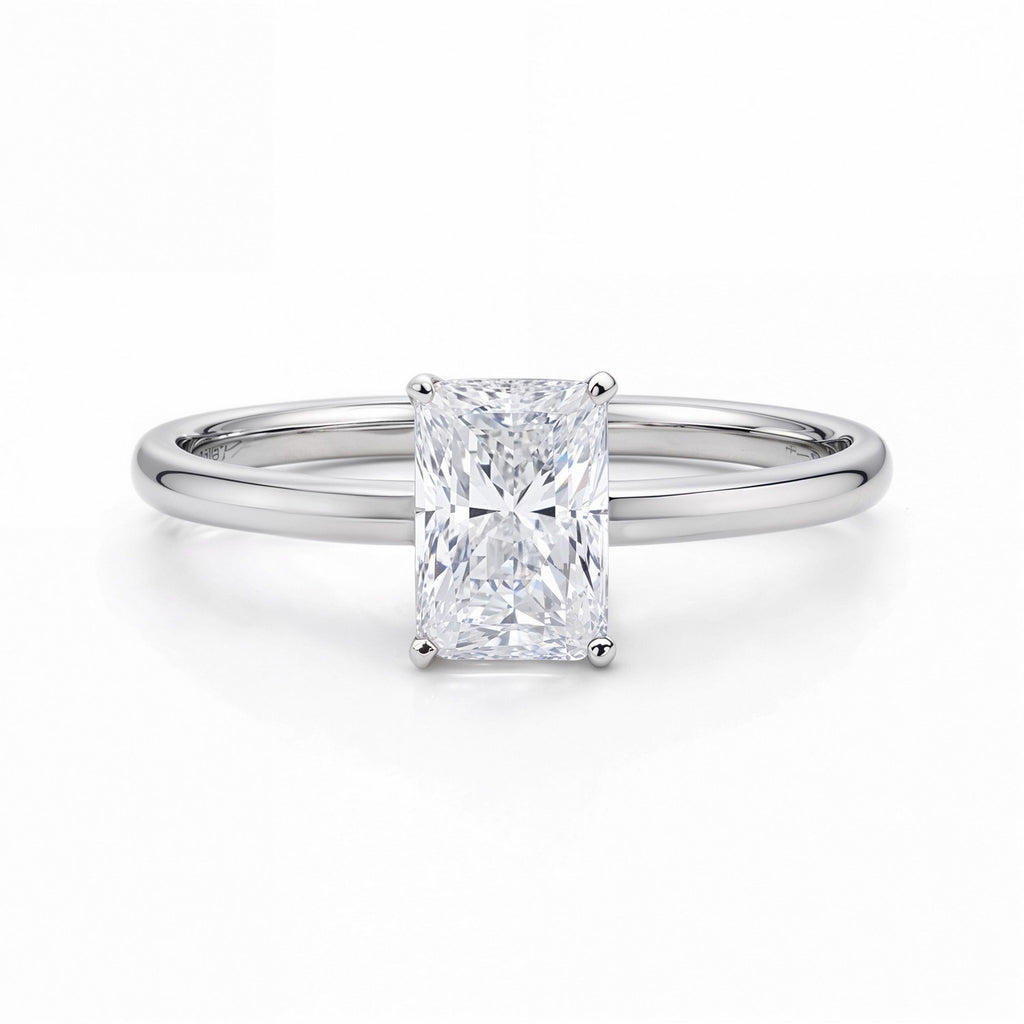 Elegant 1 carat radiant diamond solitaire ring in 14k white gold, showcasing timeless luxury and exquisite craftsmanship.