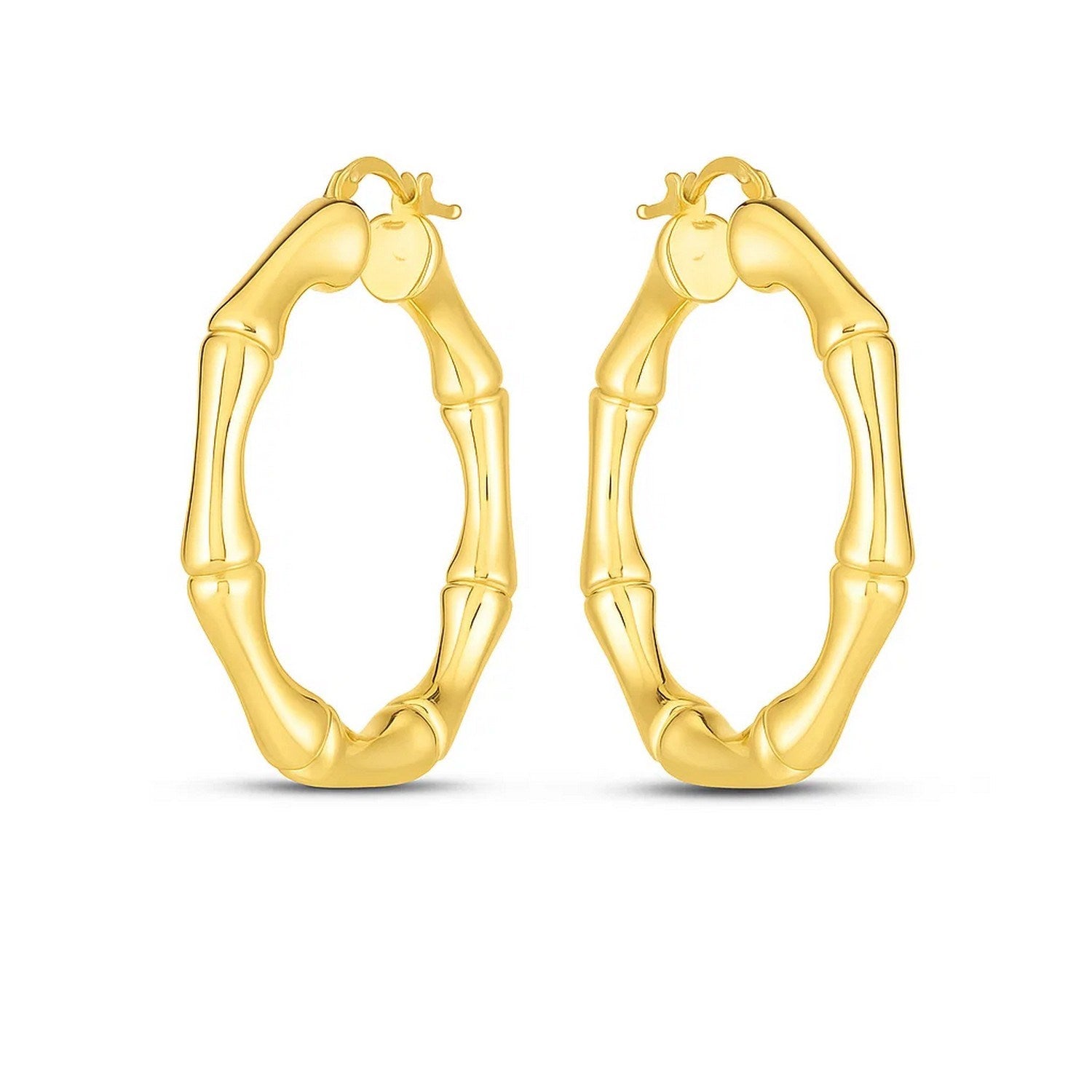 14k yellow gold textured large bamboo hoop earrings, showcasing modern elegance and luxurious craftsmanship.