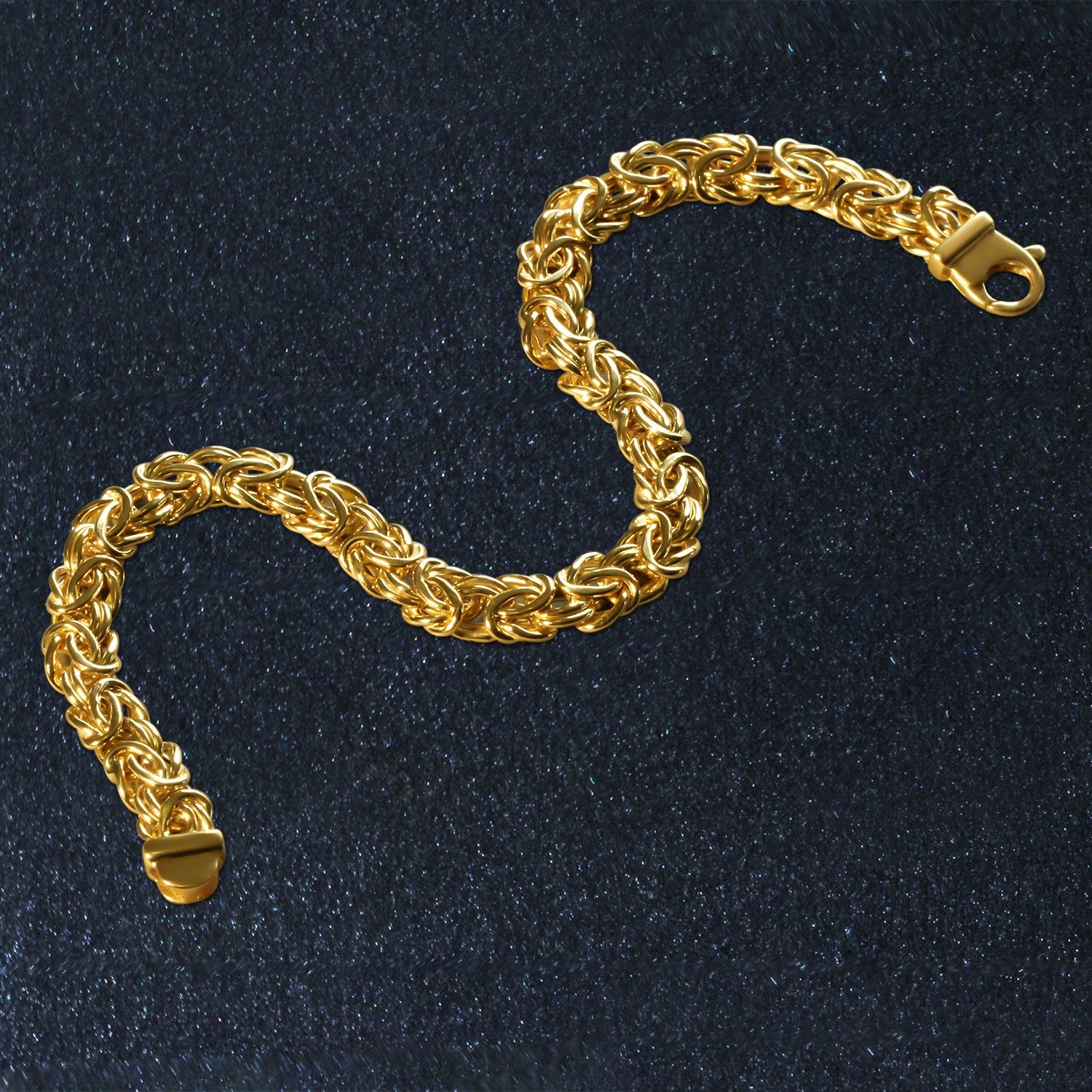 Elegant 10k yellow gold Byzantine chain bracelet, featuring intricate links and a luxurious 7.00 mm width.