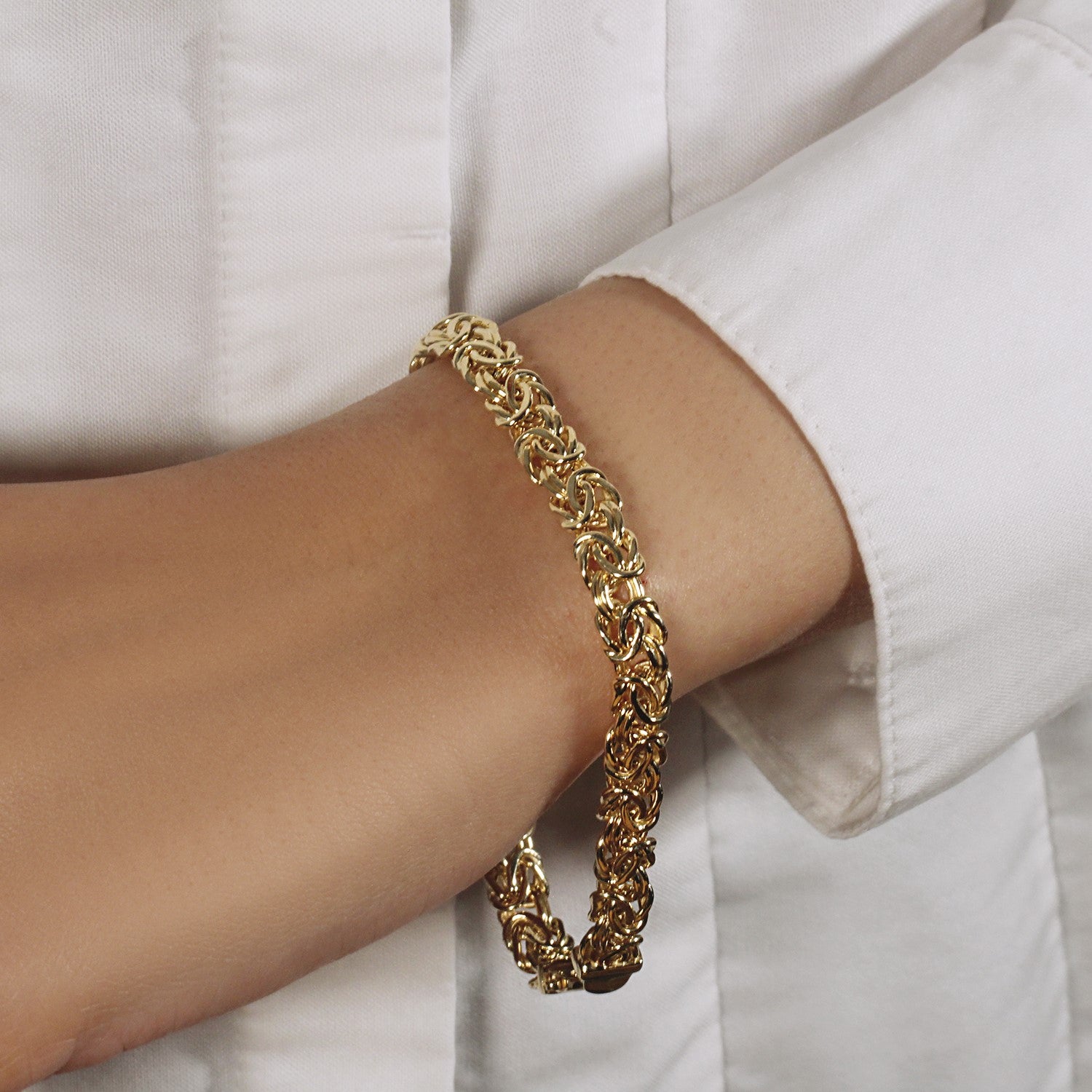 Elegant 10k yellow gold Byzantine design chain bracelet featuring intricate links and a luxurious 7.00 mm width.