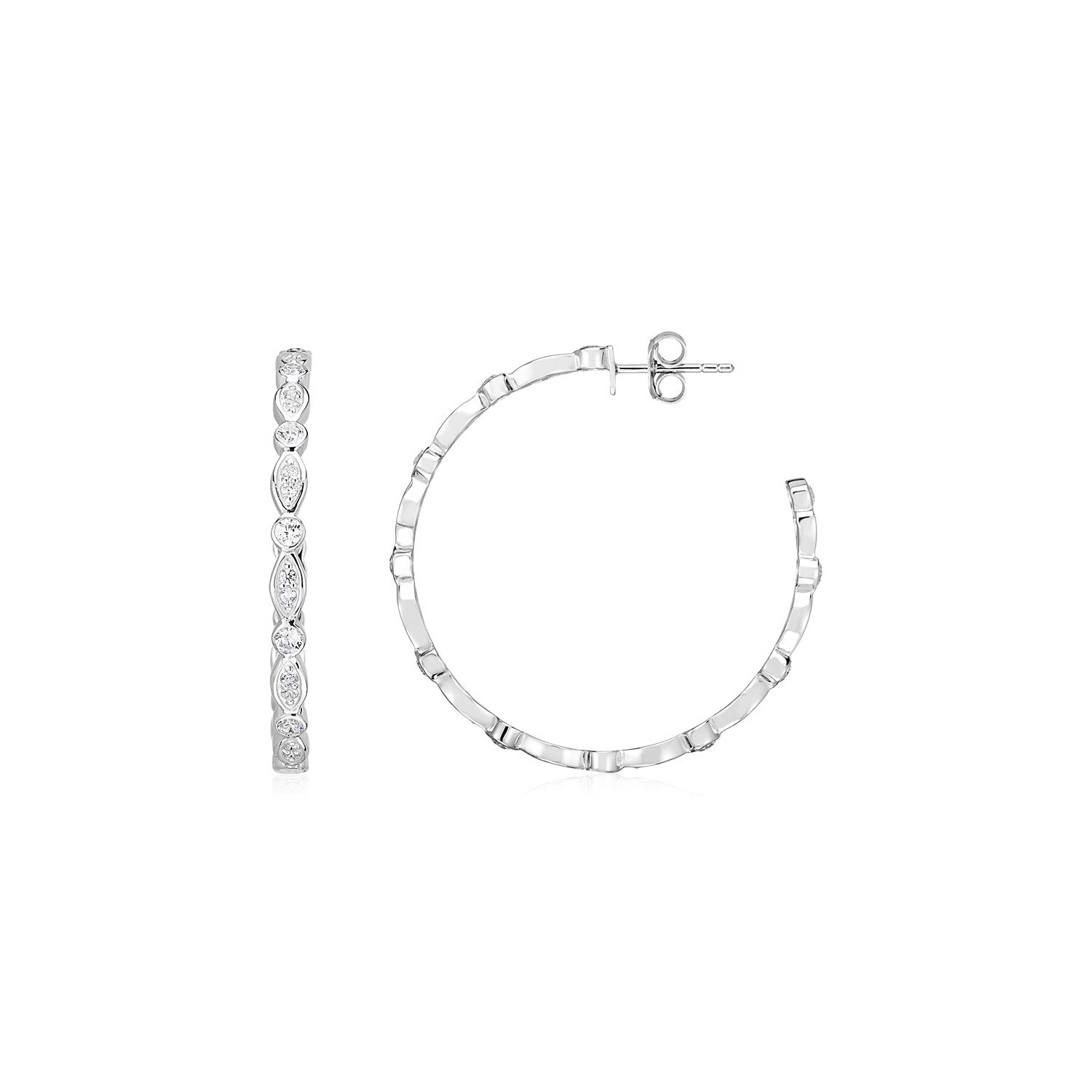 Sterling silver hoop drop earrings adorned with round and marquise cubic zirconias for an elegant touch.