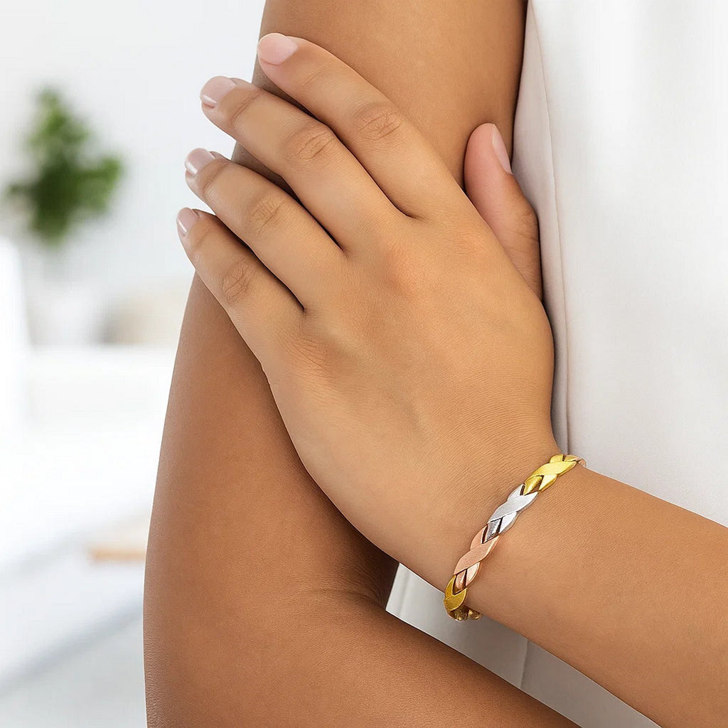 14k tri-color gold X link bracelet featuring shiny and textured finishes, exuding elegance and luxury.