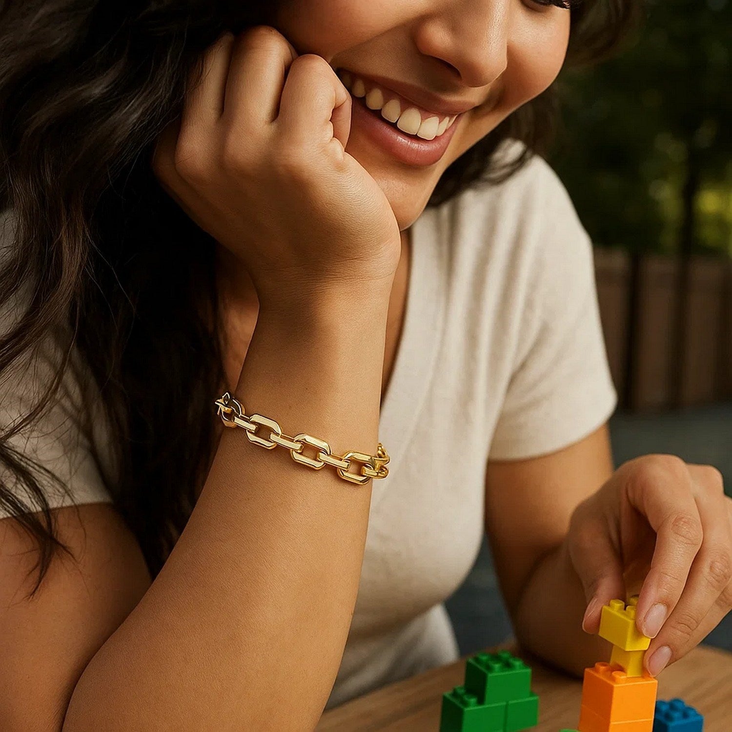 14K yellow gold faceted octagonal link chain bracelet, modern design with elegant shine and luxurious appeal.