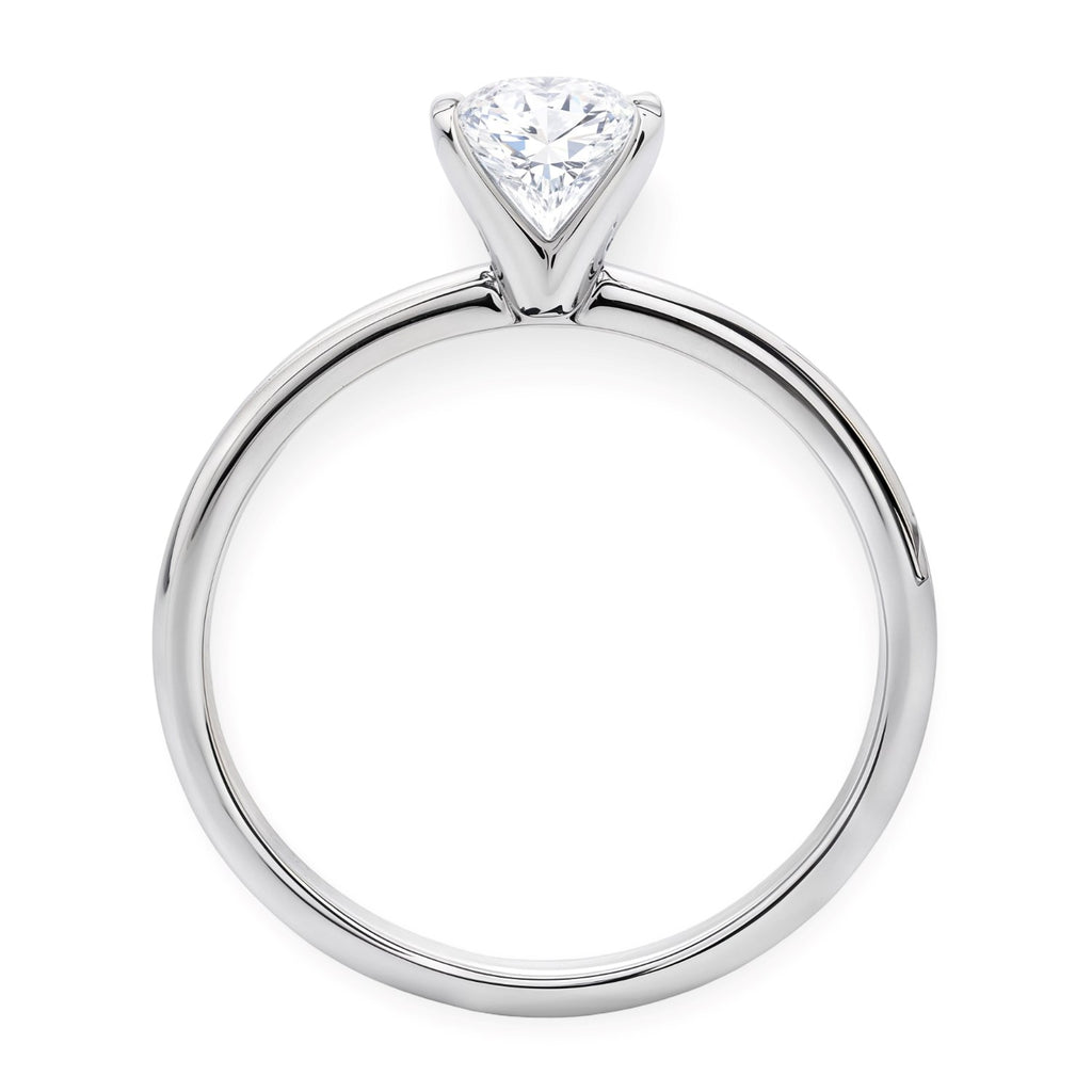 Elegant 10K white gold solitaire ring featuring a 1 carat oval lab-grown diamond in a stunning halo setting.
