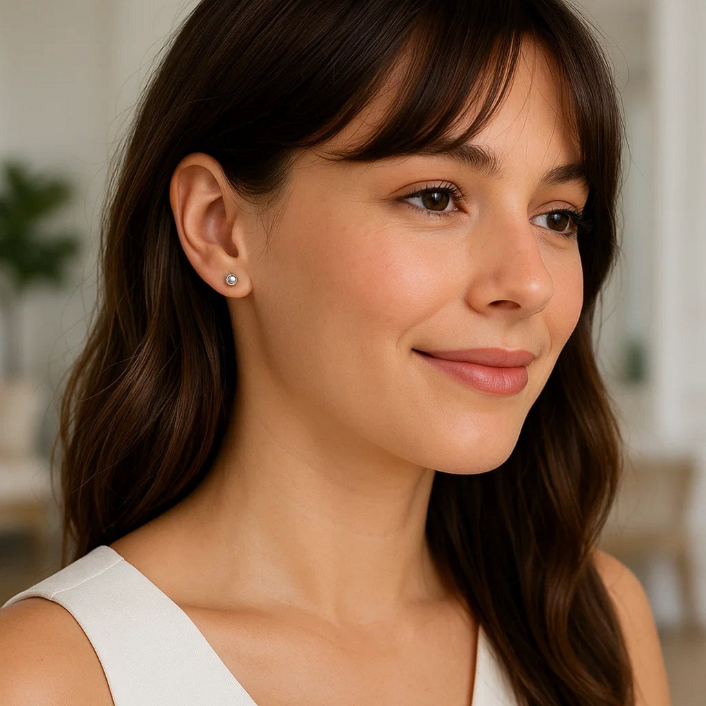 14k white gold polished round stud earrings with a contemporary design, perfect for elegant everyday wear.