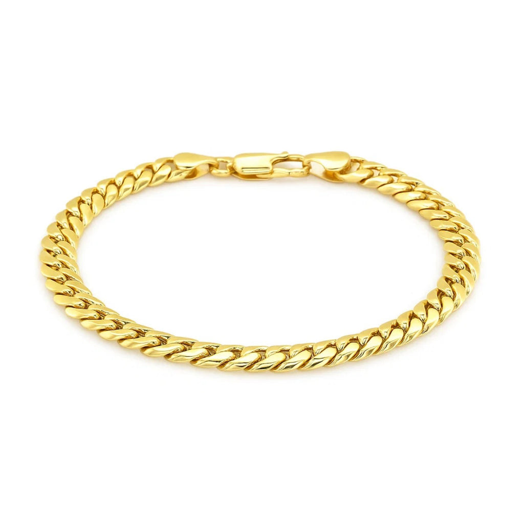 14k yellow gold Miami Cuban bracelet, semi-solid design with round links, showcasing contemporary elegance and luxury.