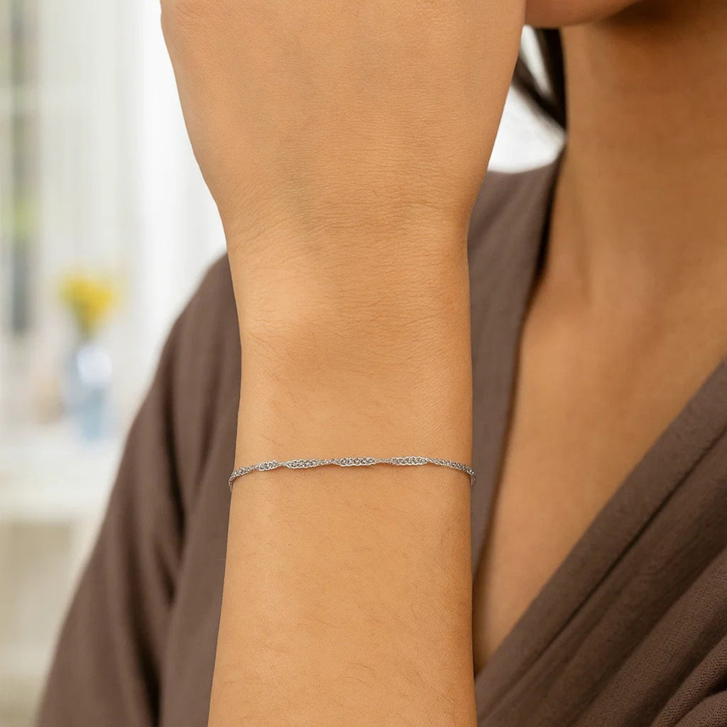 14k white gold Singapore bracelet featuring a modern design with delicate chain and stud accents, perfect for elegant styl...