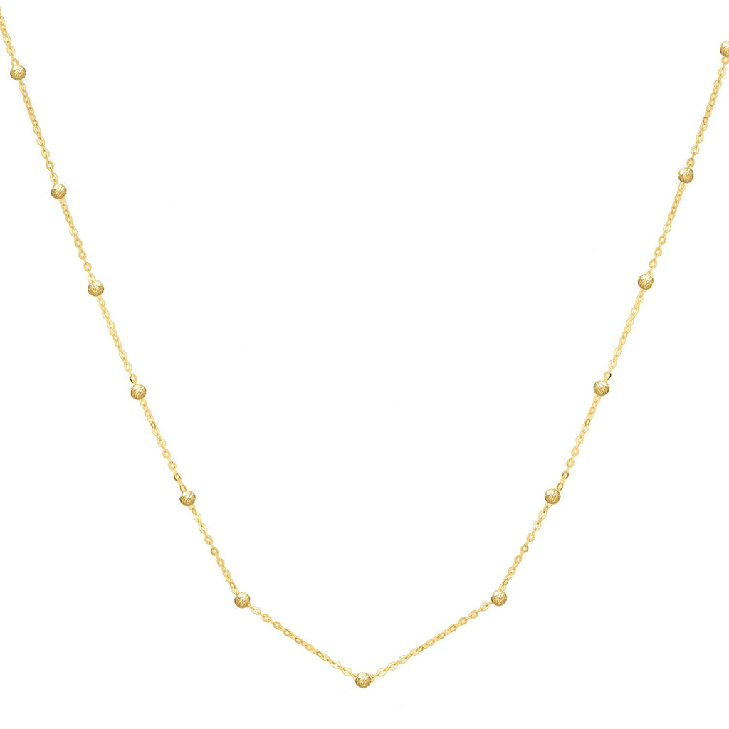 Textured Saturn bead necklace in 14k yellow gold with a modern chain design, perfect for elegant layering.