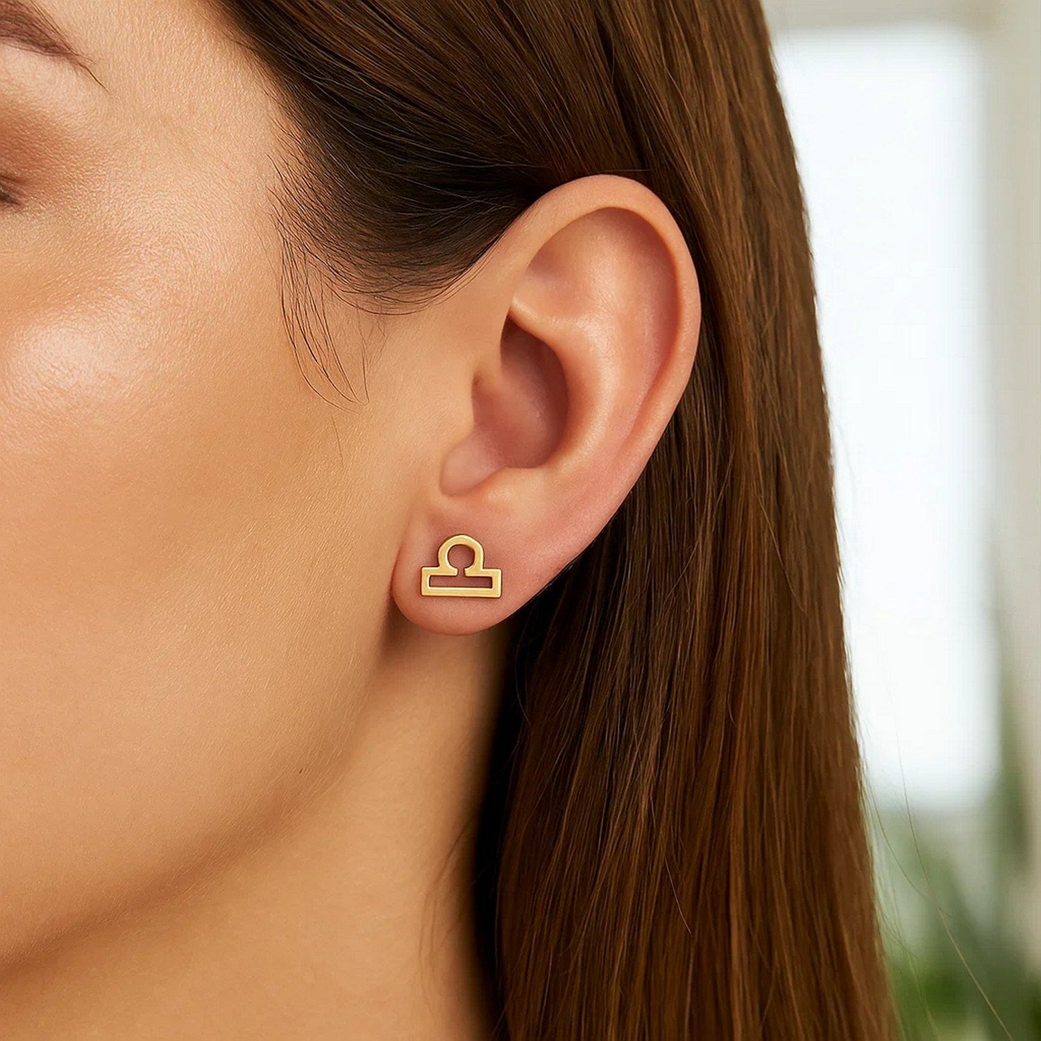 14k yellow gold modern stud earrings featuring a sleek, minimalist design perfect for everyday elegance.