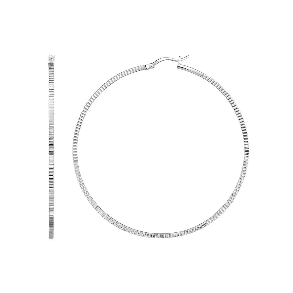 Sterling silver textured hoop earrings with a modern design, perfect for elevating any luxury jewelry collection.