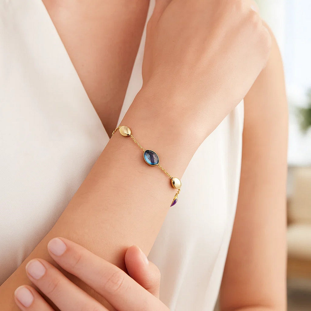 14k yellow gold modern oval gemstone and bead bracelet showcasing exquisite craftsmanship and vibrant color.