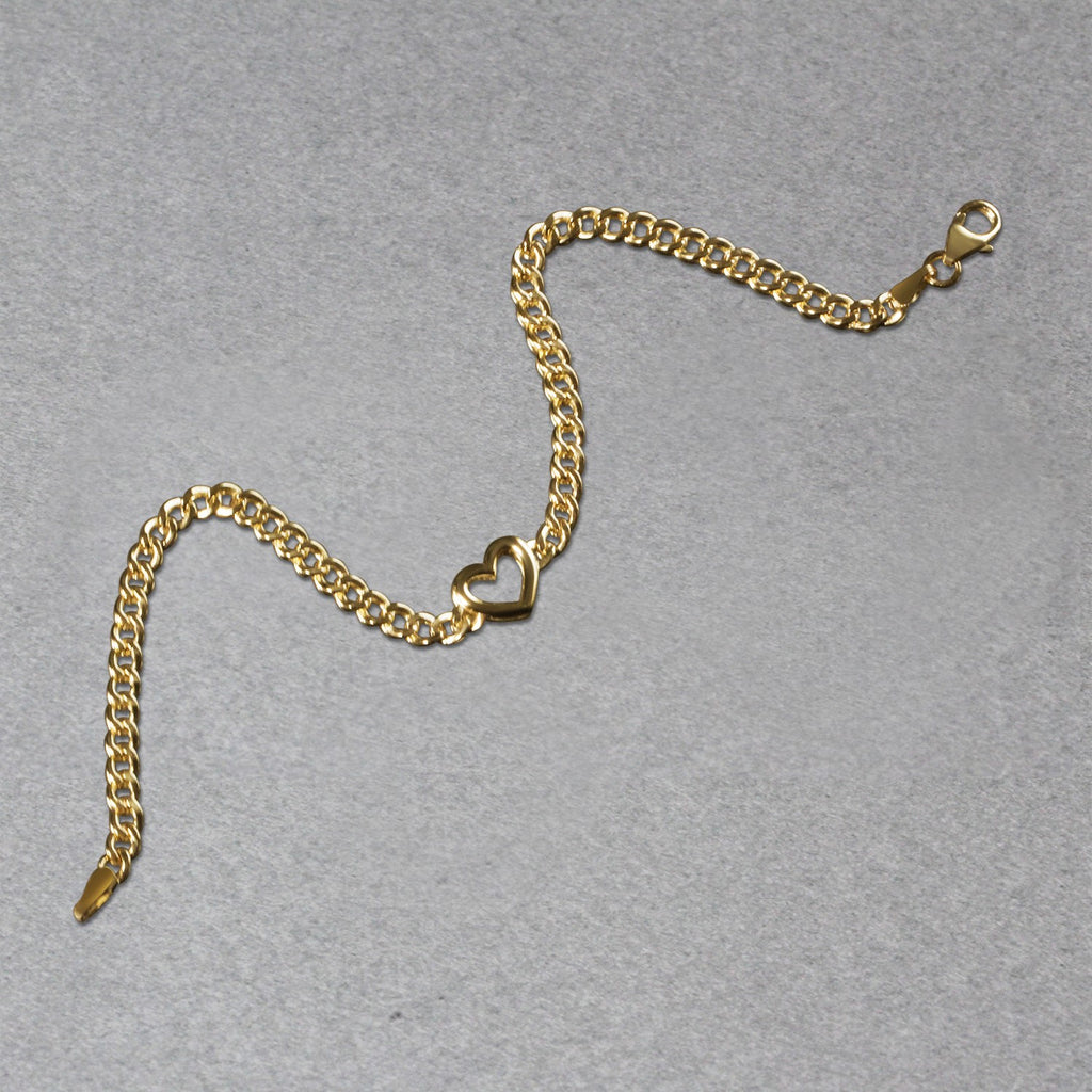 14k yellow gold curb chain bracelet with heart detail, modern design, 3.40 mm width, luxurious and elegant accessory.