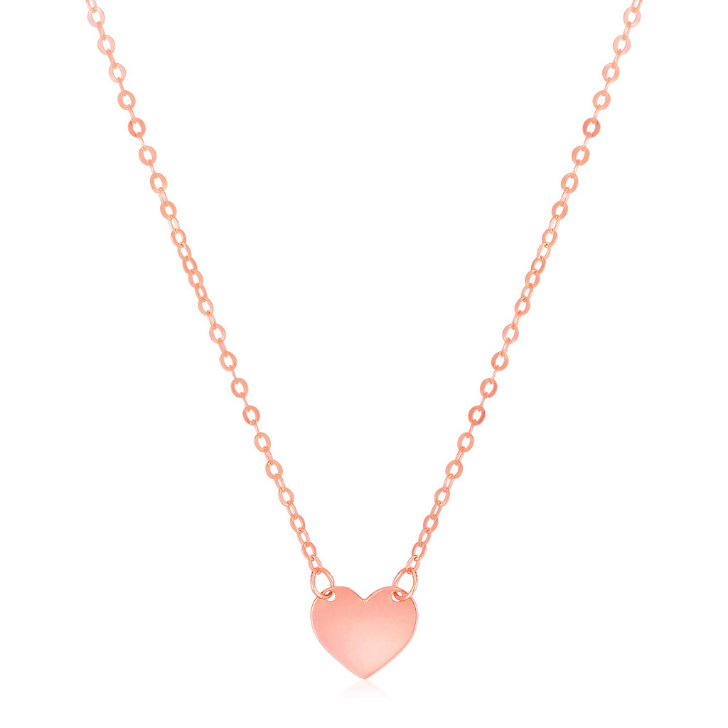 14k rose gold polished mini heart necklace with delicate chain, embodying timeless elegance and classic charm.