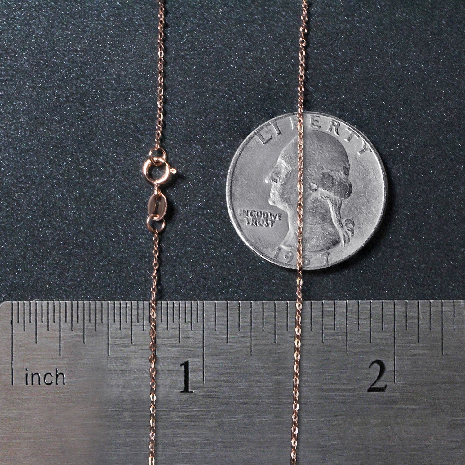 14k rose gold polished mini heart necklace with a delicate chain, embodying timeless elegance and classic charm.