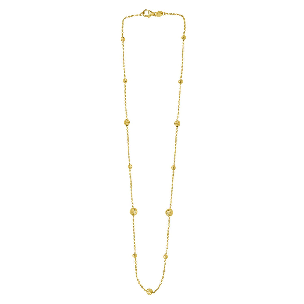 Elegant 14k yellow gold alternating bead chain necklace adorned with sparkling diamonds, showcasing refined luxury.