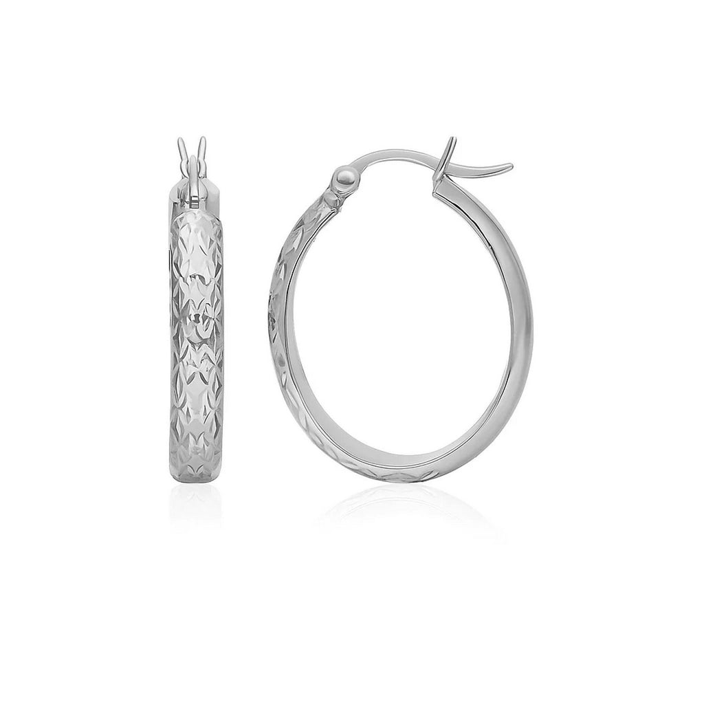 14k white gold hammered oval hoop earrings, showcasing modern elegance and refined craftsmanship for luxury jewelry lovers.