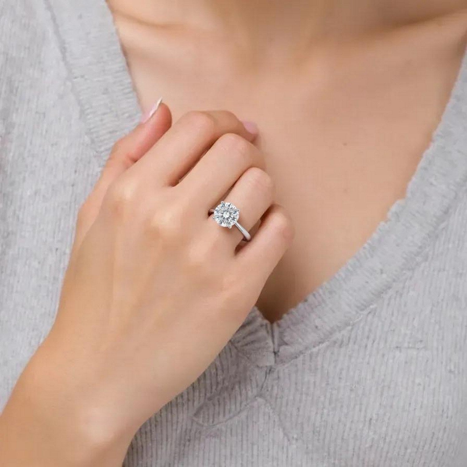 1 1/2 carat round lab-grown diamond ring in elegant 10K white gold, featuring a stunning G/VS1 clarity stone.