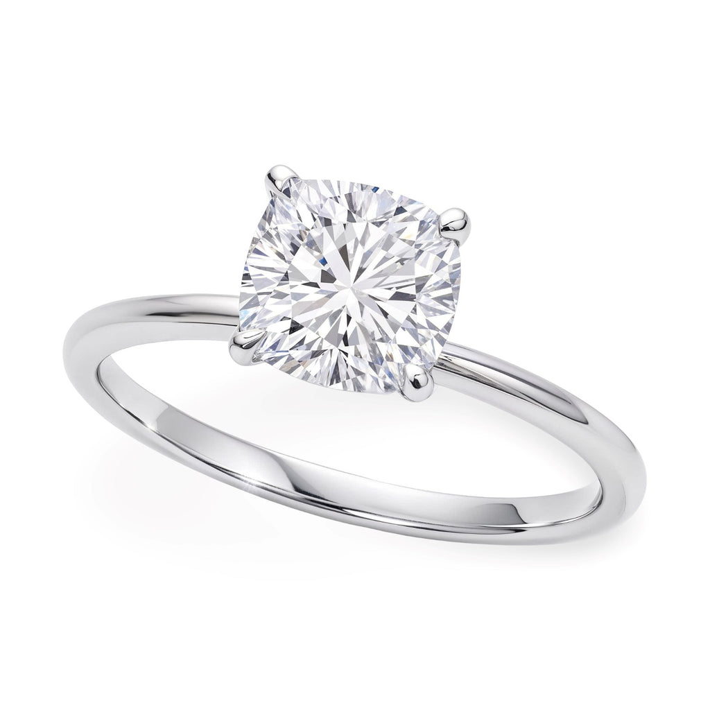 2 carat cushion cut lab-grown diamond solitaire ring in 10K white gold, embodying timeless elegance and luxury.