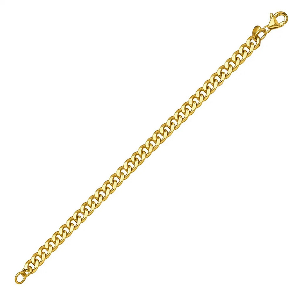 14k yellow gold petite faceted Cuban link chain bracelet, elegantly designed with 4.50 mm links for a luxurious touch.