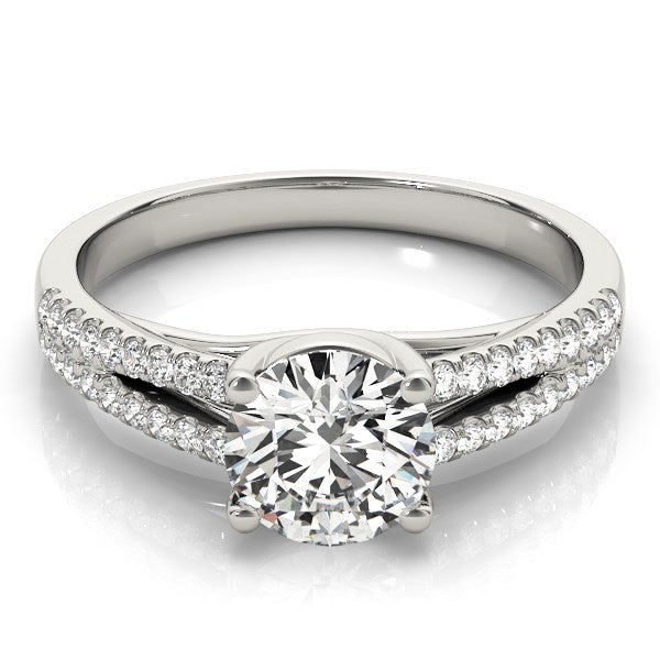 Elegant 14k white gold split shank engagement ring featuring a stunning round diamond, totaling 1 1/8 cttw.