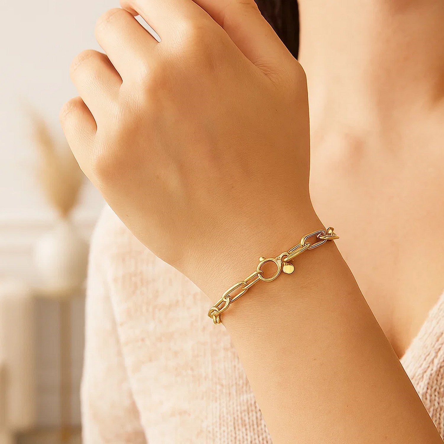 14k yellow gold charm lock paperclip chain bracelet with modern design and elegant finish, perfect for luxury styling.