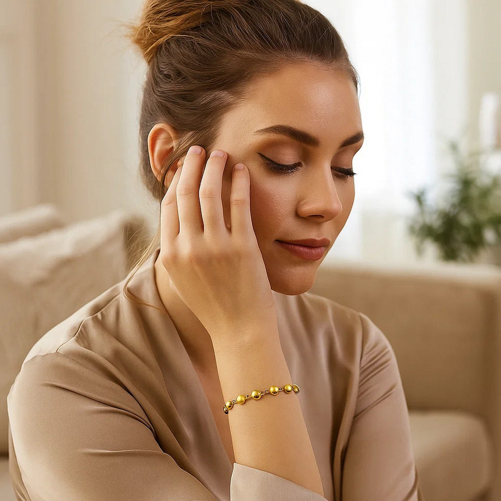 14k yellow gold polished and satin pebble bracelet, 6mm, exuding elegance and luxury in a timeless design.