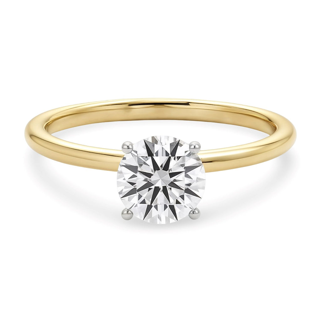 Elegant 1 carat round diamond solitaire ring in 14k yellow gold, showcasing timeless luxury and exquisite craftsmanship.