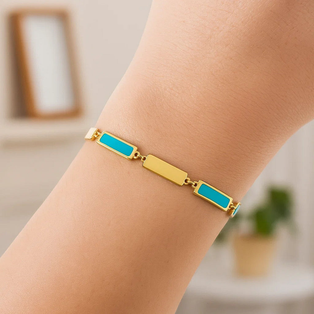 14k yellow gold bracelet featuring turquoise rectangle links and elegant diamond accents for a luxurious touch.