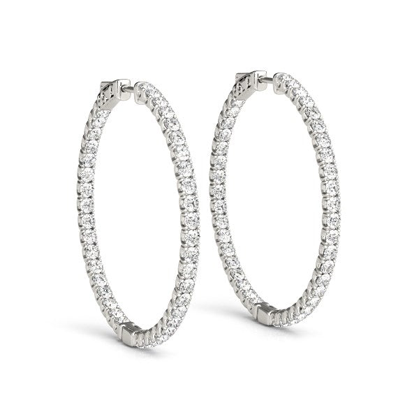 14k white gold diamond hoop drop earrings featuring a shared prong setting for timeless elegance and sophistication.
