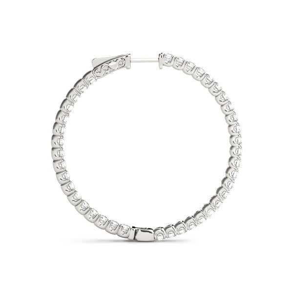 14k white gold diamond hoop drop earrings featuring a shared prong setting for a timeless, elegant look.