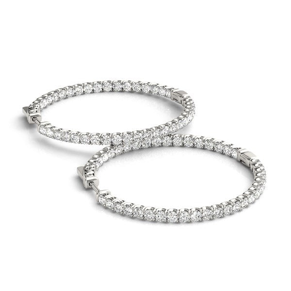 14k white gold diamond hoop drop earrings featuring a shared prong setting for timeless elegance and sophistication.
