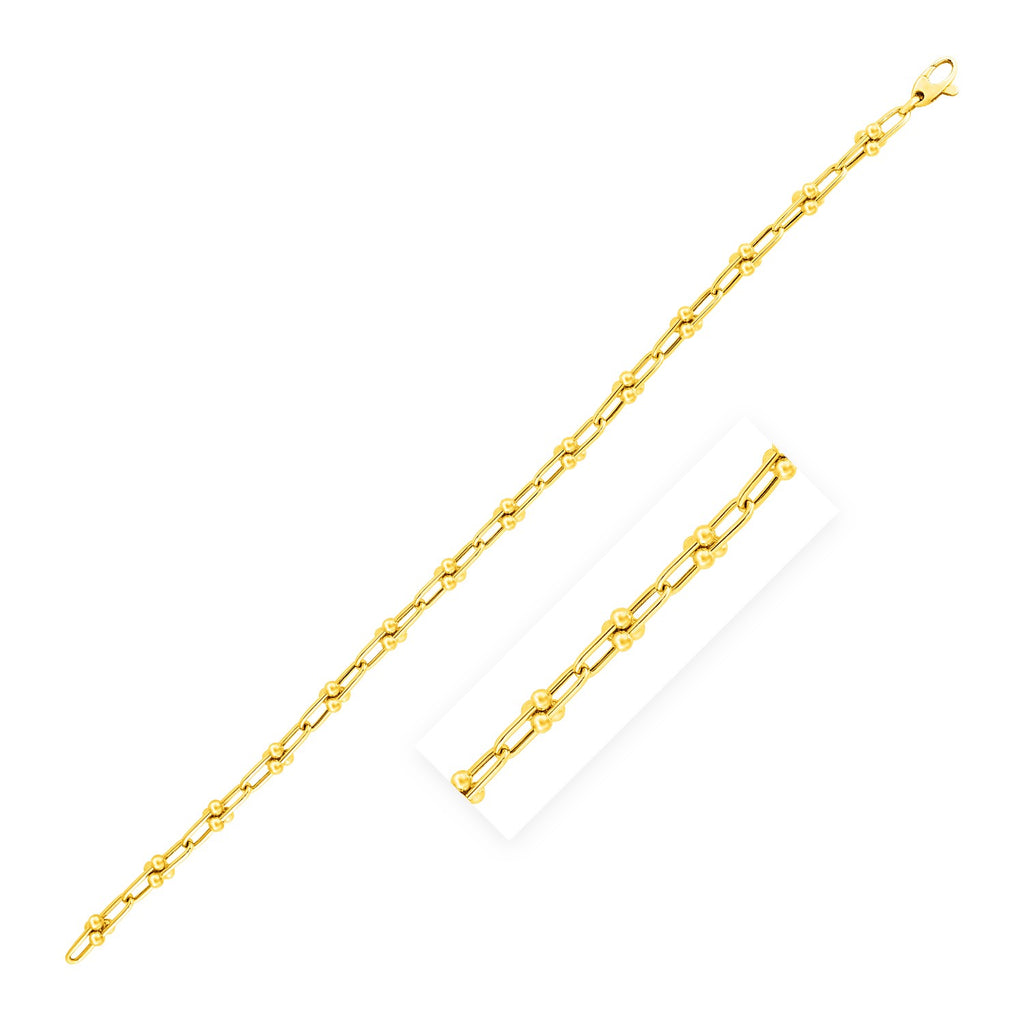 14k yellow gold Jax chain bracelet featuring modern link design, 7 1/2 inches, perfect for elegant layering.