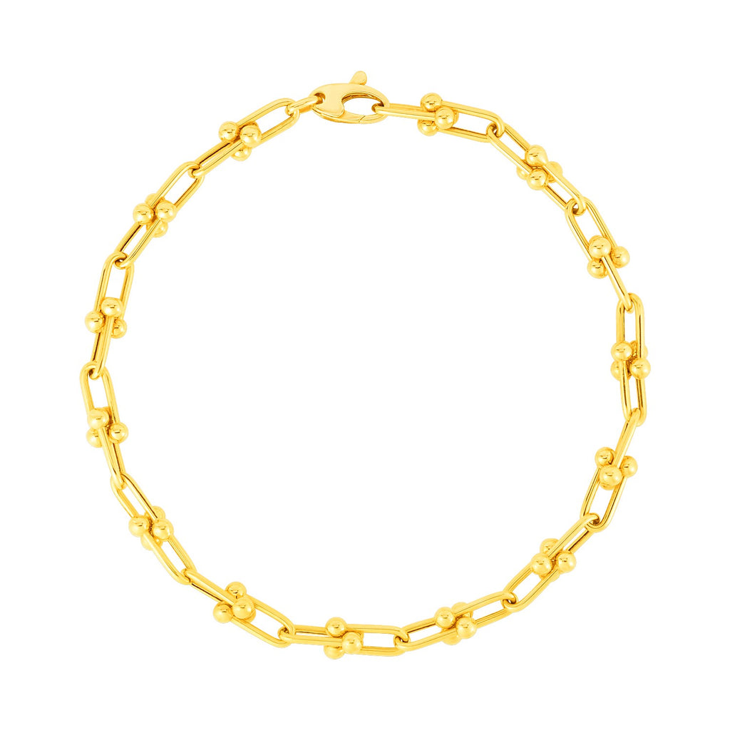 14k yellow gold Jax chain bracelet featuring modern link design, 7 1/2 inches, perfect for elegant layering.