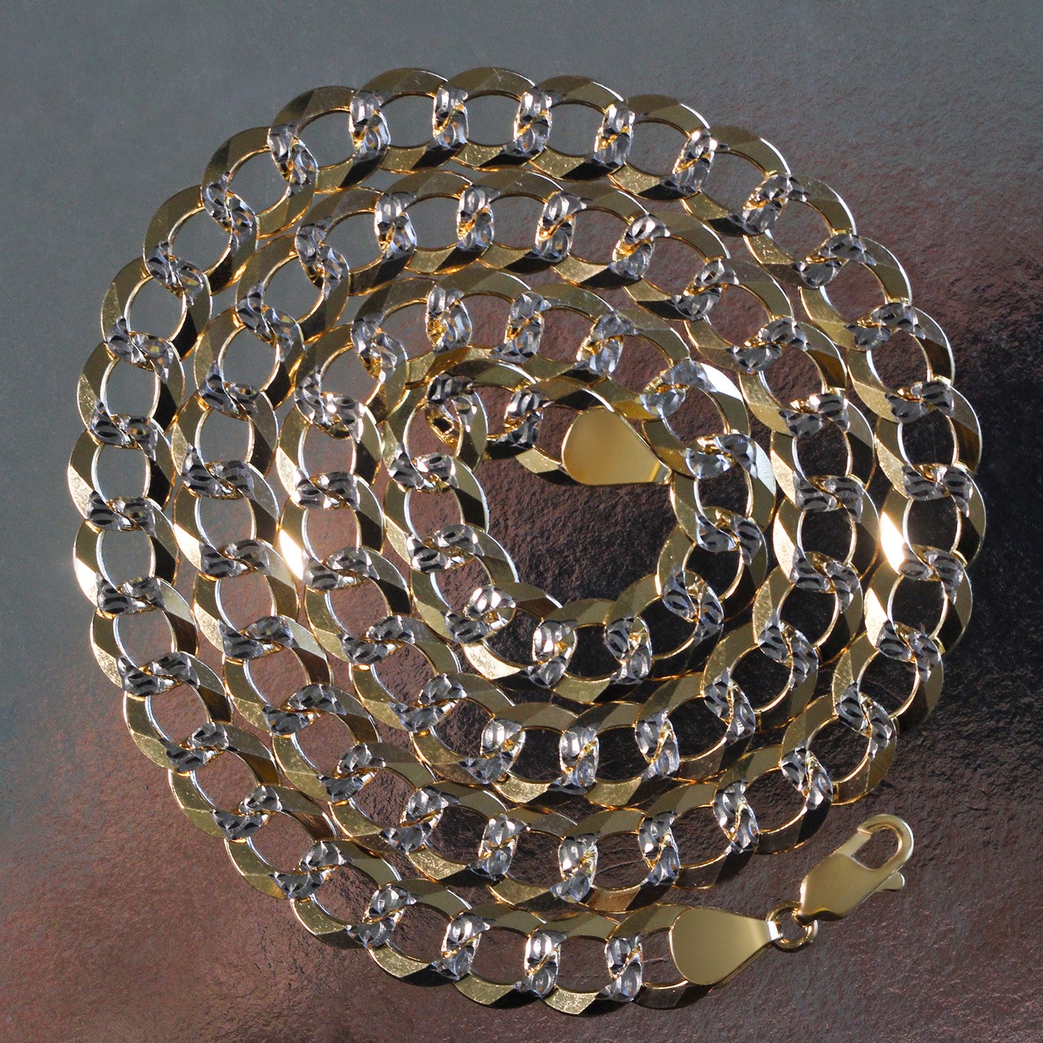 14k two-tone gold pave curb chain with a classic design, featuring a luxurious 10 mm width and elegant round links.