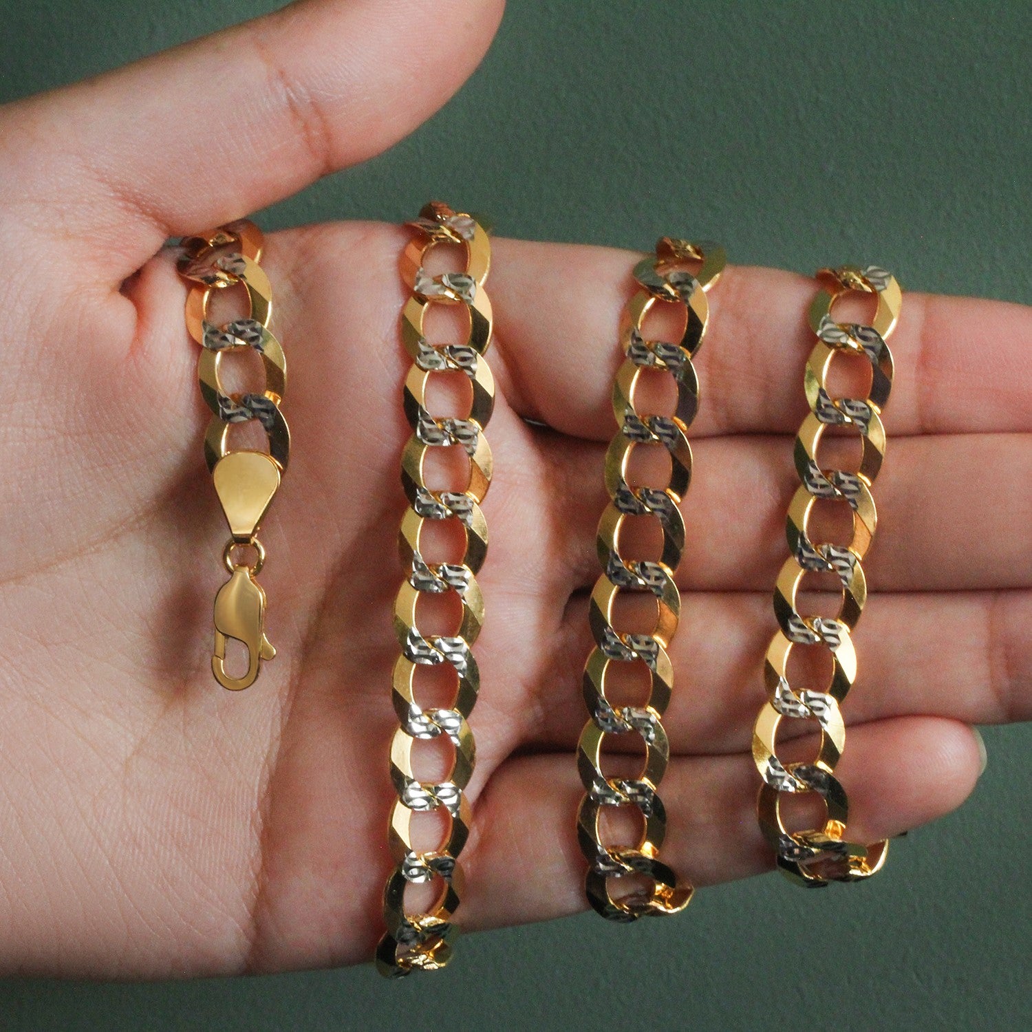 14k two-tone gold pave curb chain showcasing a classic design with luxurious round links and a polished finish.