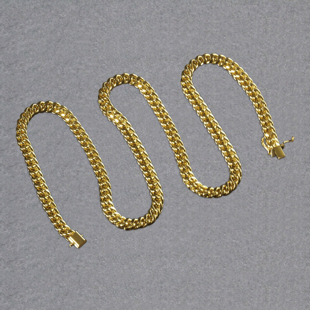 14k yellow gold semi-solid Miami Cuban chain, 6.10 mm, featuring an elegant round design for a luxurious look.