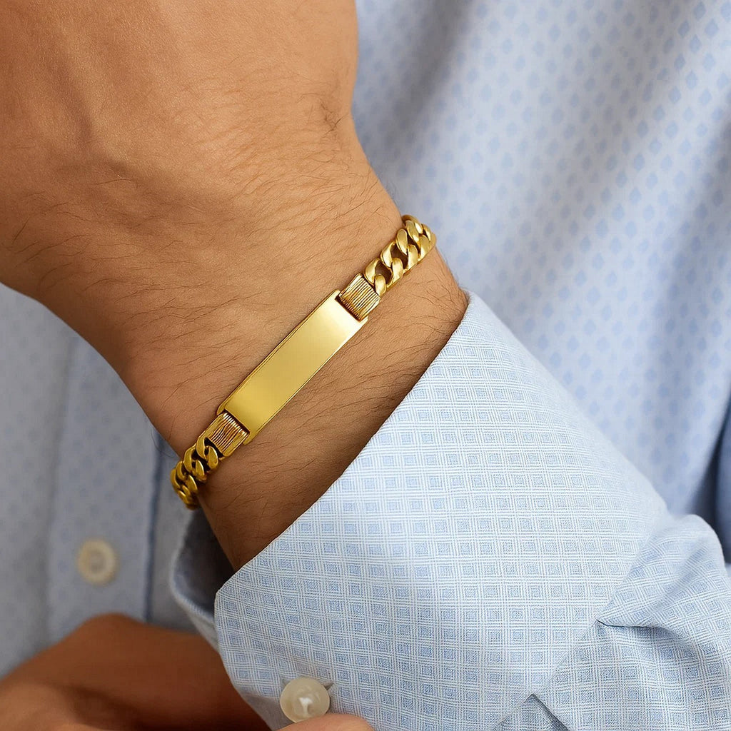 14K yellow gold Lite Cuban ID bracelet with modern link design, showcasing elegance and luxury in every detail.