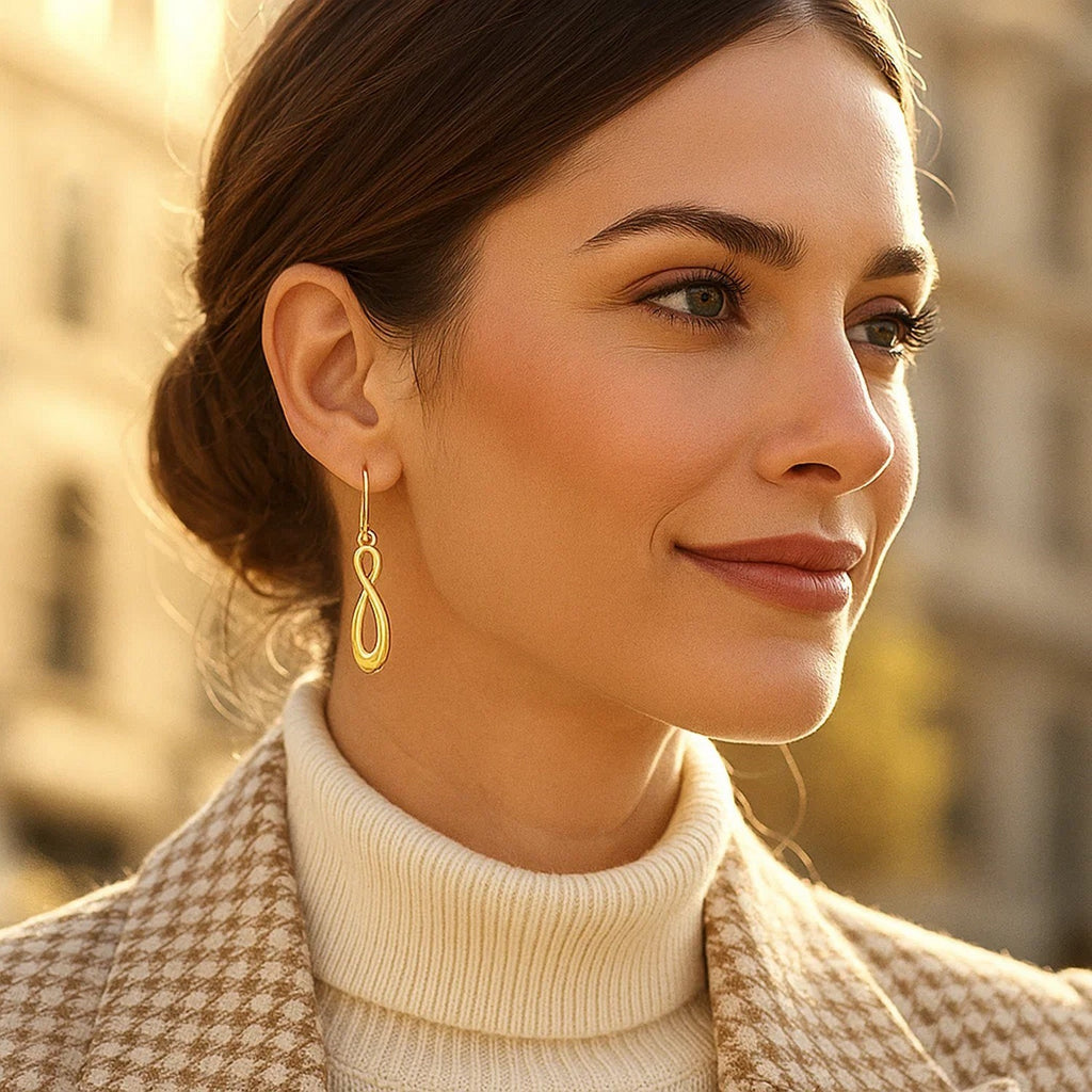 Elegant 14k yellow gold polished hoop earrings showcasing a timeless design for sophisticated style.