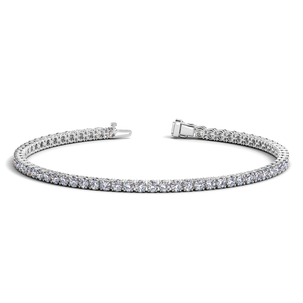Lab grown round diamond tennis bracelet in 14k white gold, featuring elegant design and 3 cctw F/G VS2/SI1 diamonds.