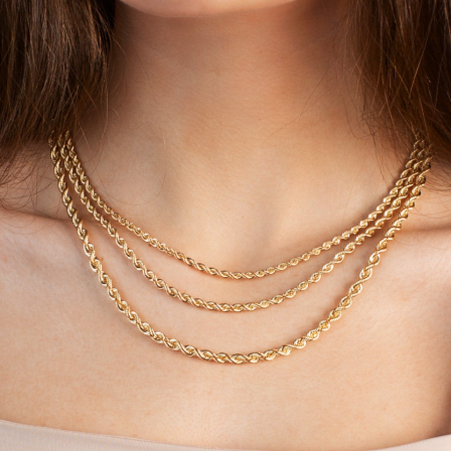 14k yellow gold light rope chain (4.3 mm) with a contemporary design, perfect for layering or wearing solo.