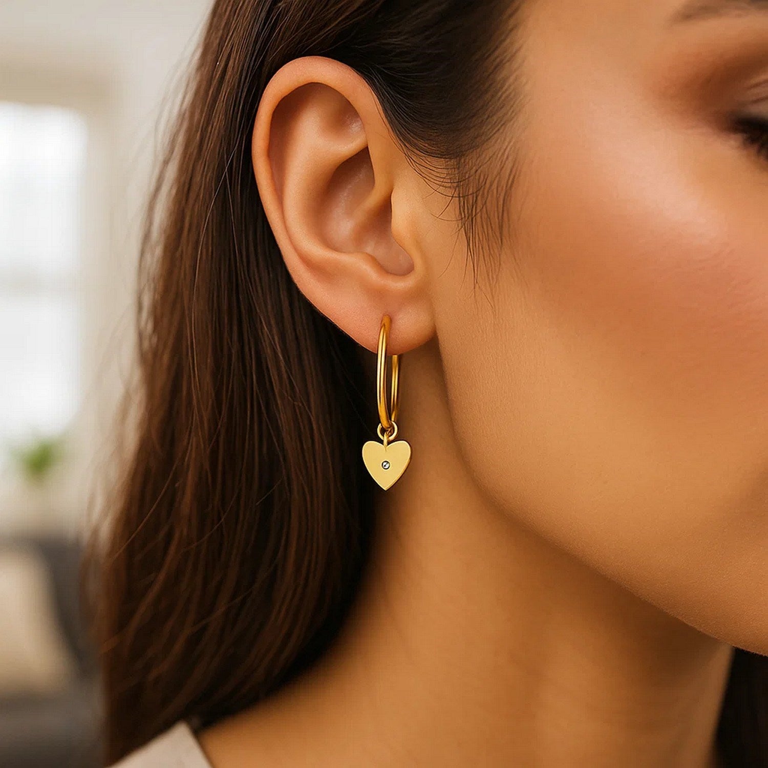 14K yellow gold diamond heart charm hoop earrings with contemporary design and exquisite sparkle.