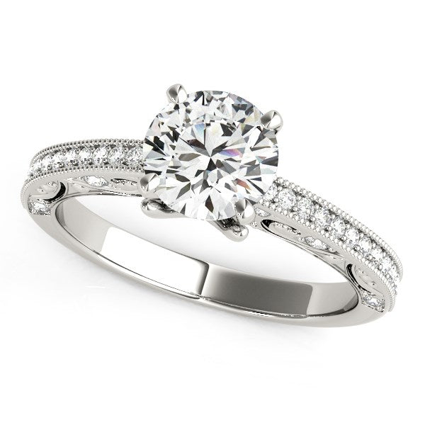 14k white gold vintage engagement ring featuring a prong-set round diamond, totaling 1 1/8 cttw.