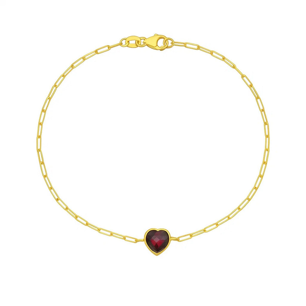 Elegant 14k yellow gold bracelet featuring a heart-shaped garnet on a delicate chain design.