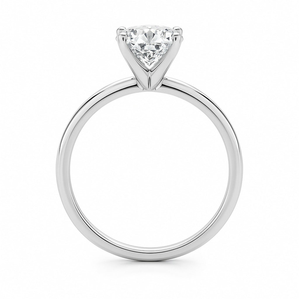 1 1/2 carat cushion cut diamond solitaire ring in 10K white gold, showcasing modern elegance and timeless luxury.