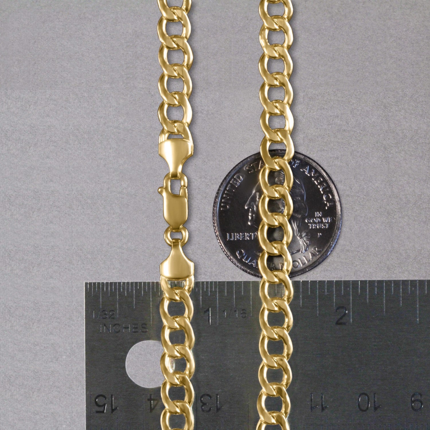 Elegant 10k yellow gold curb chain, 6.20 mm links, showcasing luxurious 14k gold craftsmanship and timeless design.