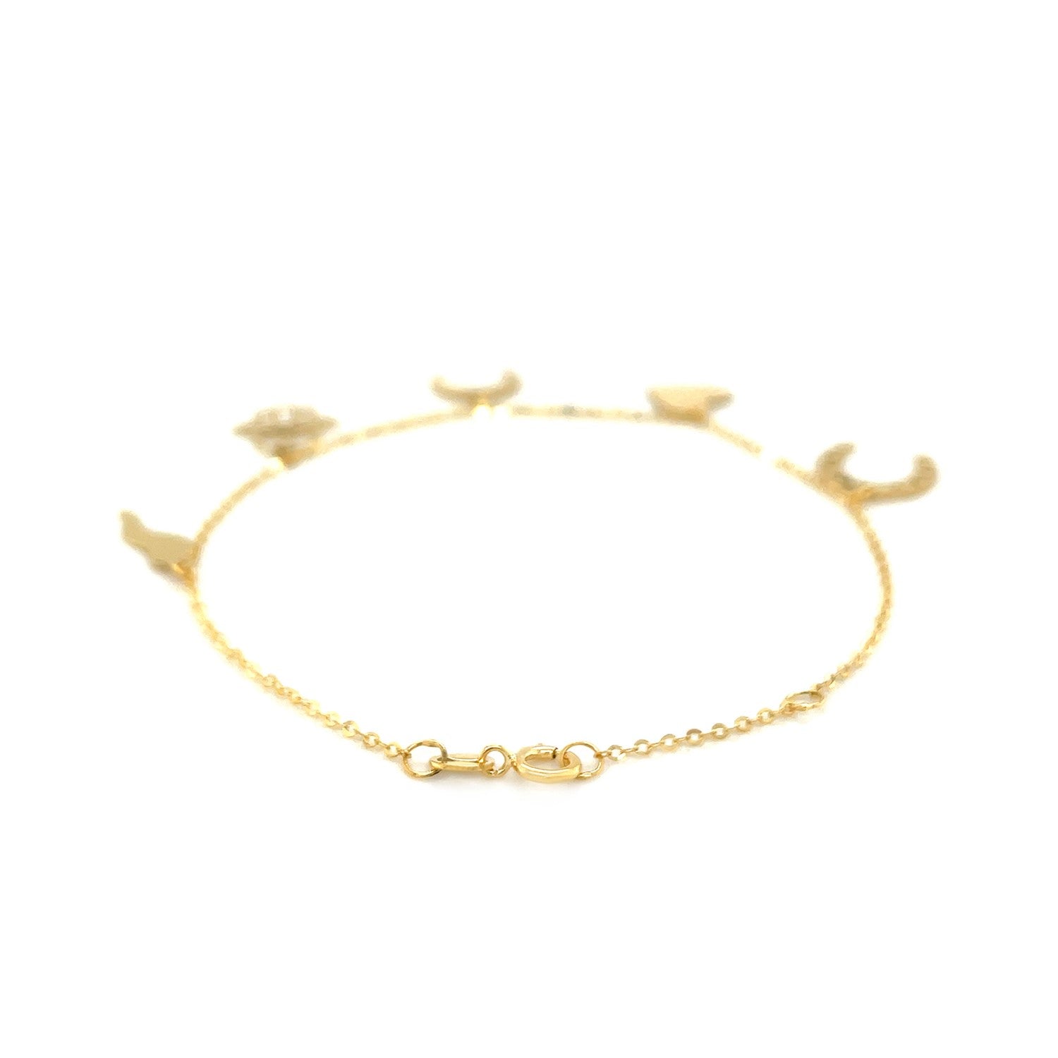 14k yellow gold 7-inch bracelet featuring polished charms in a modern chain design, perfect for elegant layering.